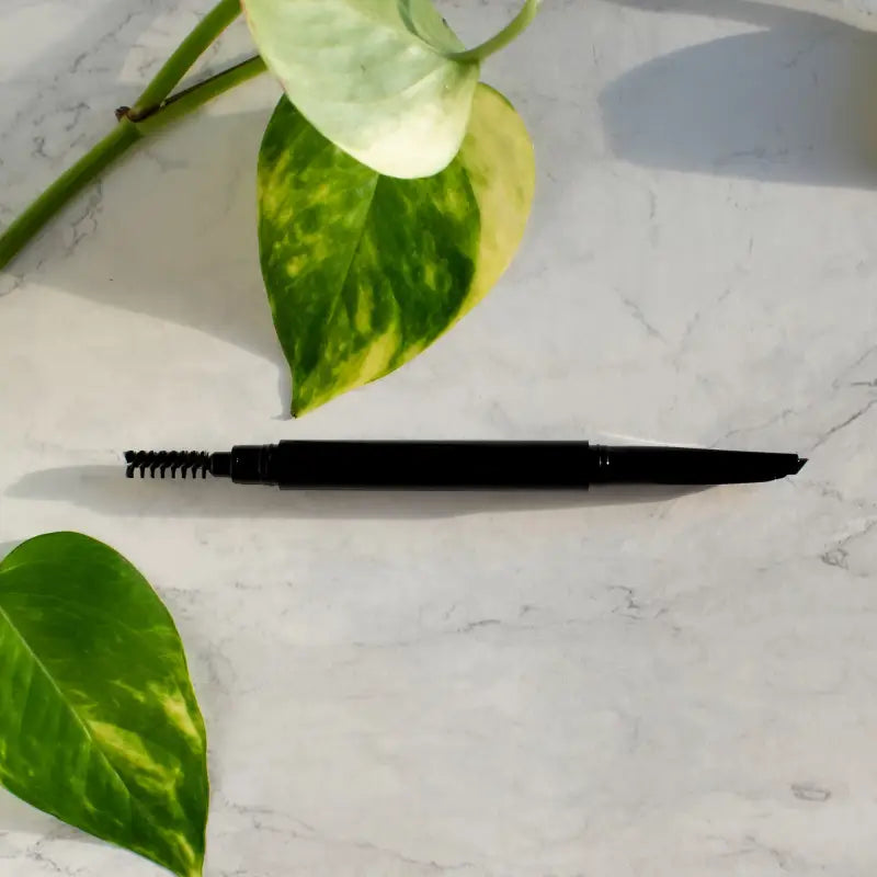 Black Automatic Eyebrow Pencil with spooly tip and MAWI branding for perfect brows