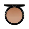 Compact powder foundation in black case with beige iron oxide pressed powder inside