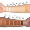 Swatches of Dual Blend Powder Foundation - French shades on arms with product labels