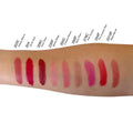 Arm showcasing lipstick swatches with numbers, featuring nourishing castor seed oil