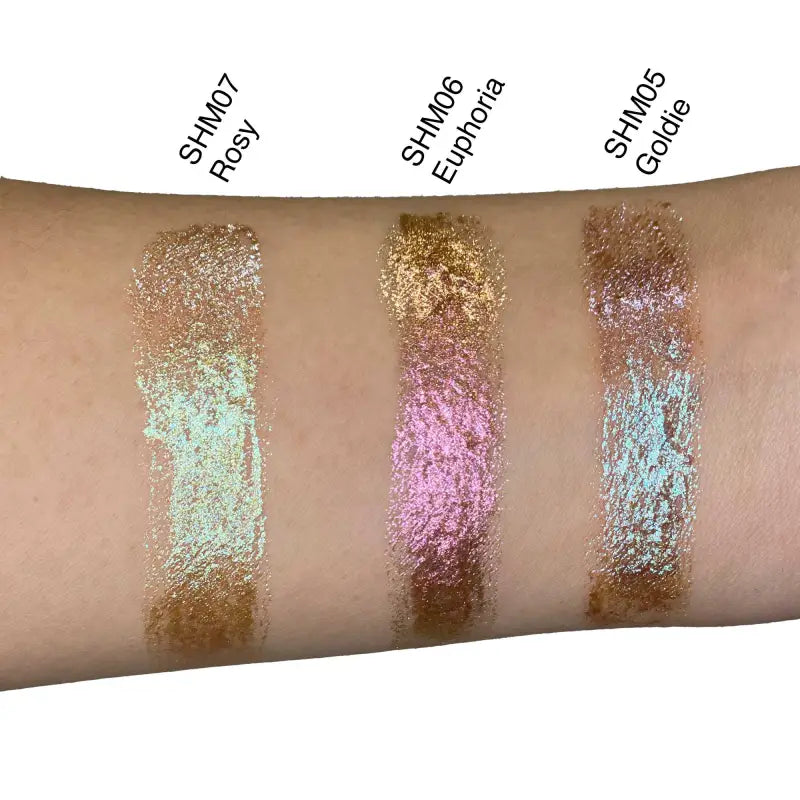 Swatches of Liquid Shimmer - Euphoria applied to skin for a vibrant beauty routine