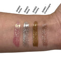 Swatches of Liquid Shimmer - Hottie by Aevanti in pink, silver, gold, and champagne shades