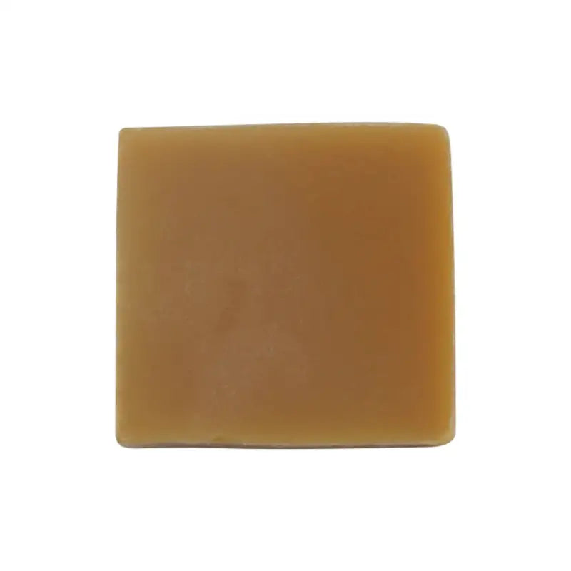 High-quality natural soap bar with black packaging labeled YAANI, infused with goat milk